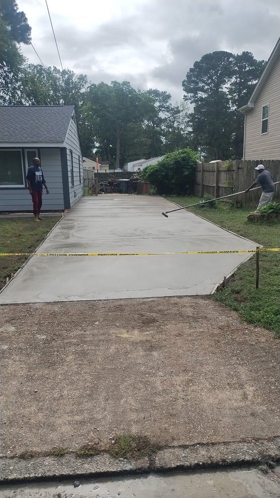 Finished concrete driveway with a broom finish