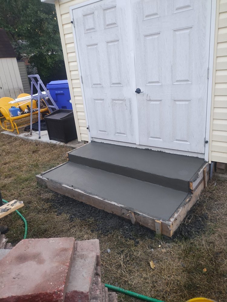 Poured concrete front steps and landing